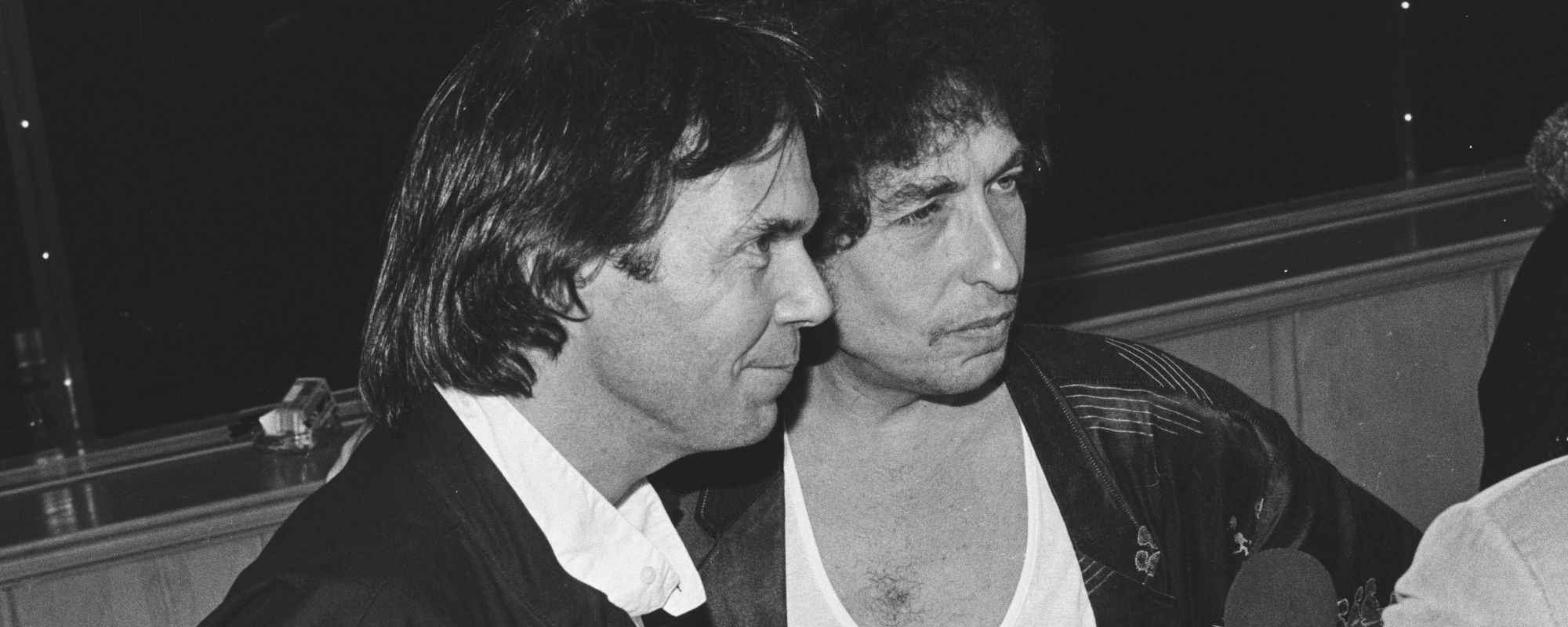 Neil Young and Bob Dylan standing together